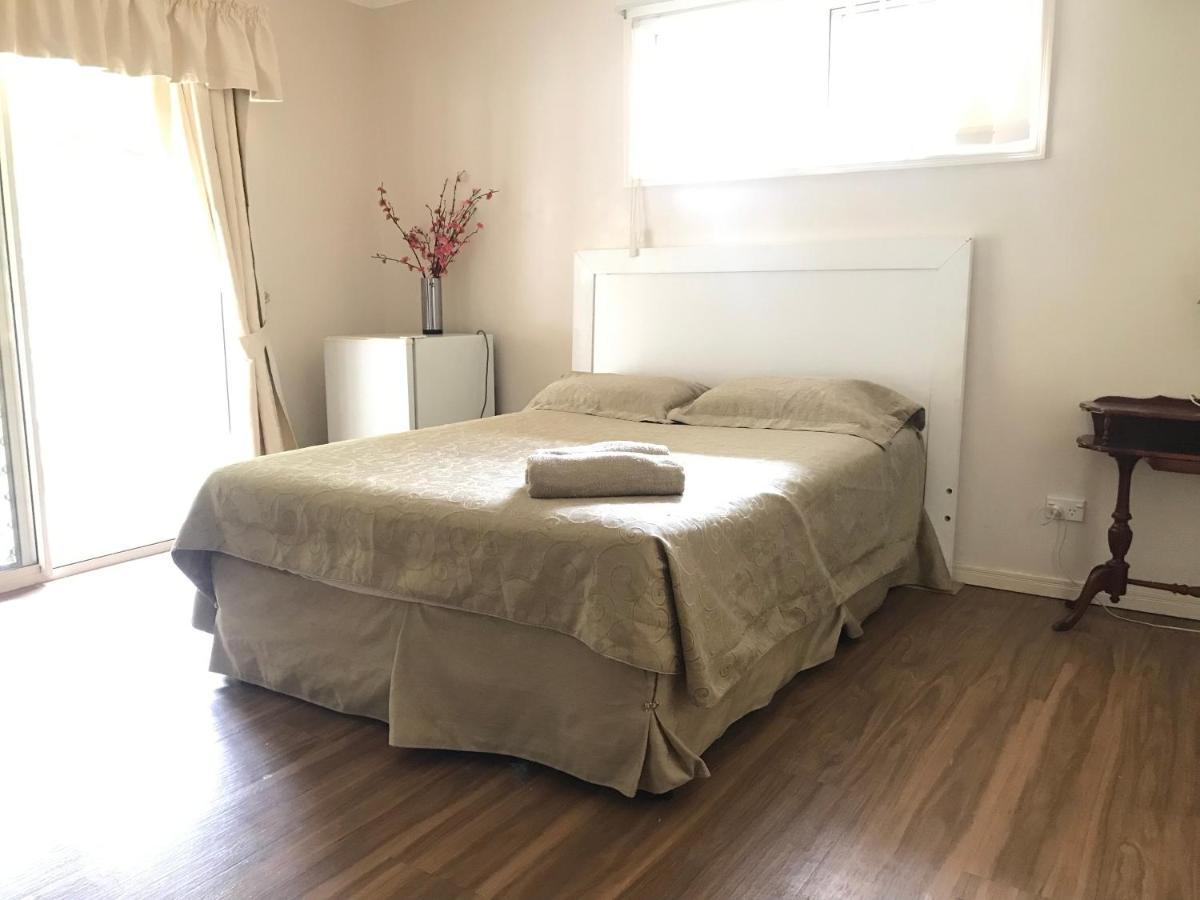 Theme Parks Amituofo Homestay Gold Coast Esterno foto