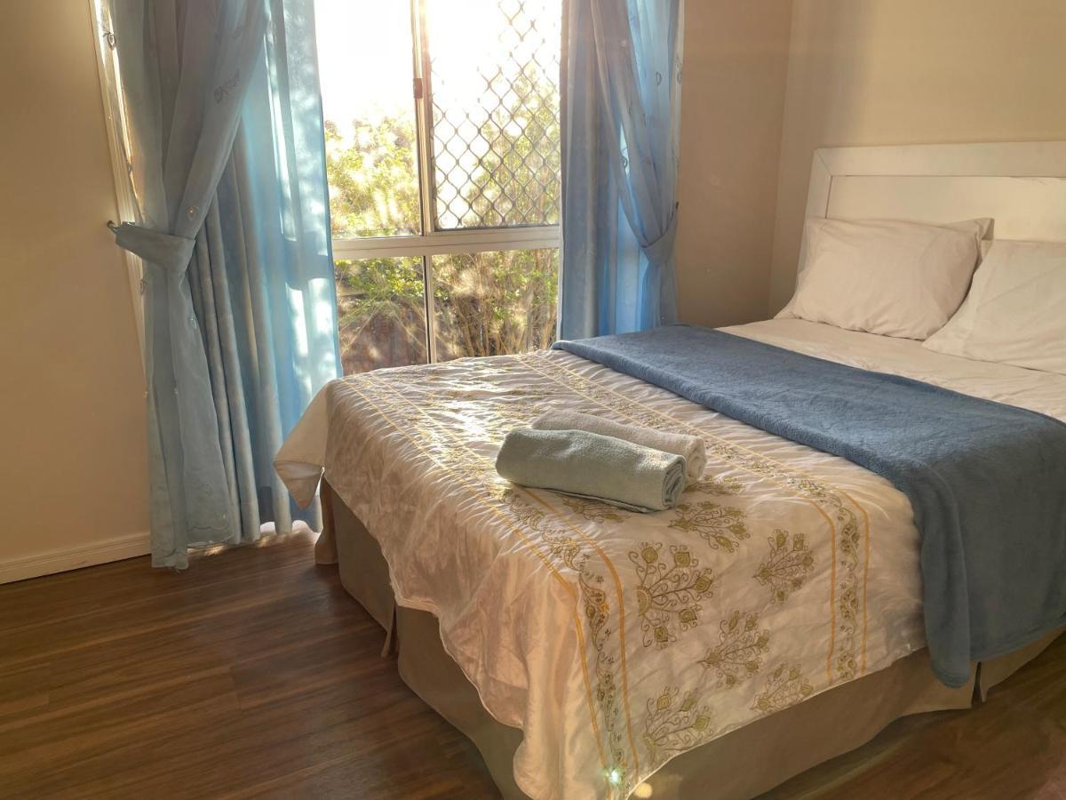 Theme Parks Amituofo Homestay Gold Coast Esterno foto