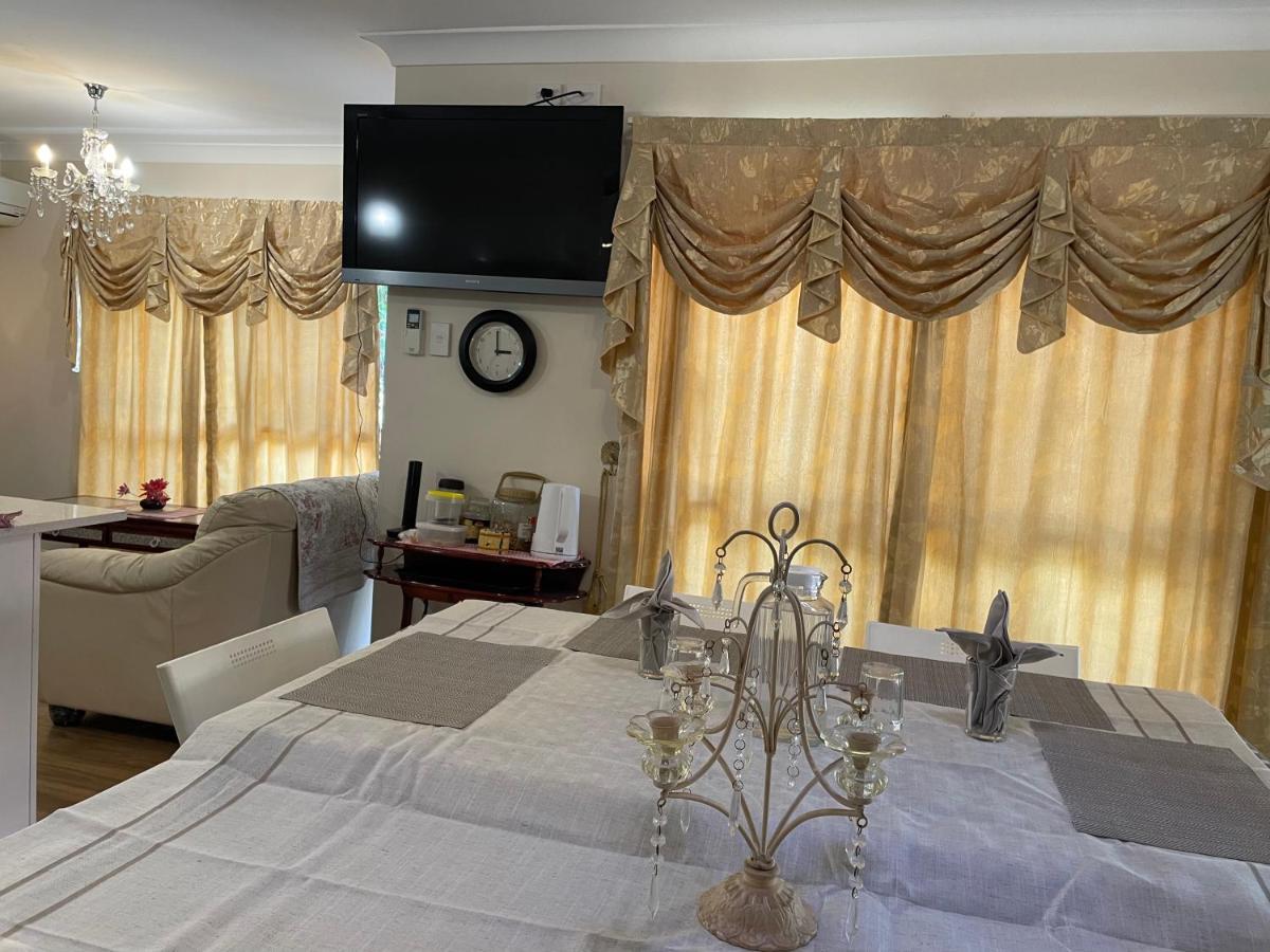Theme Parks Amituofo Homestay Gold Coast Esterno foto